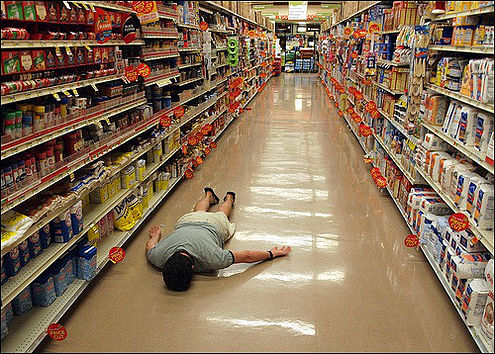 ManFacedownAtGrocery