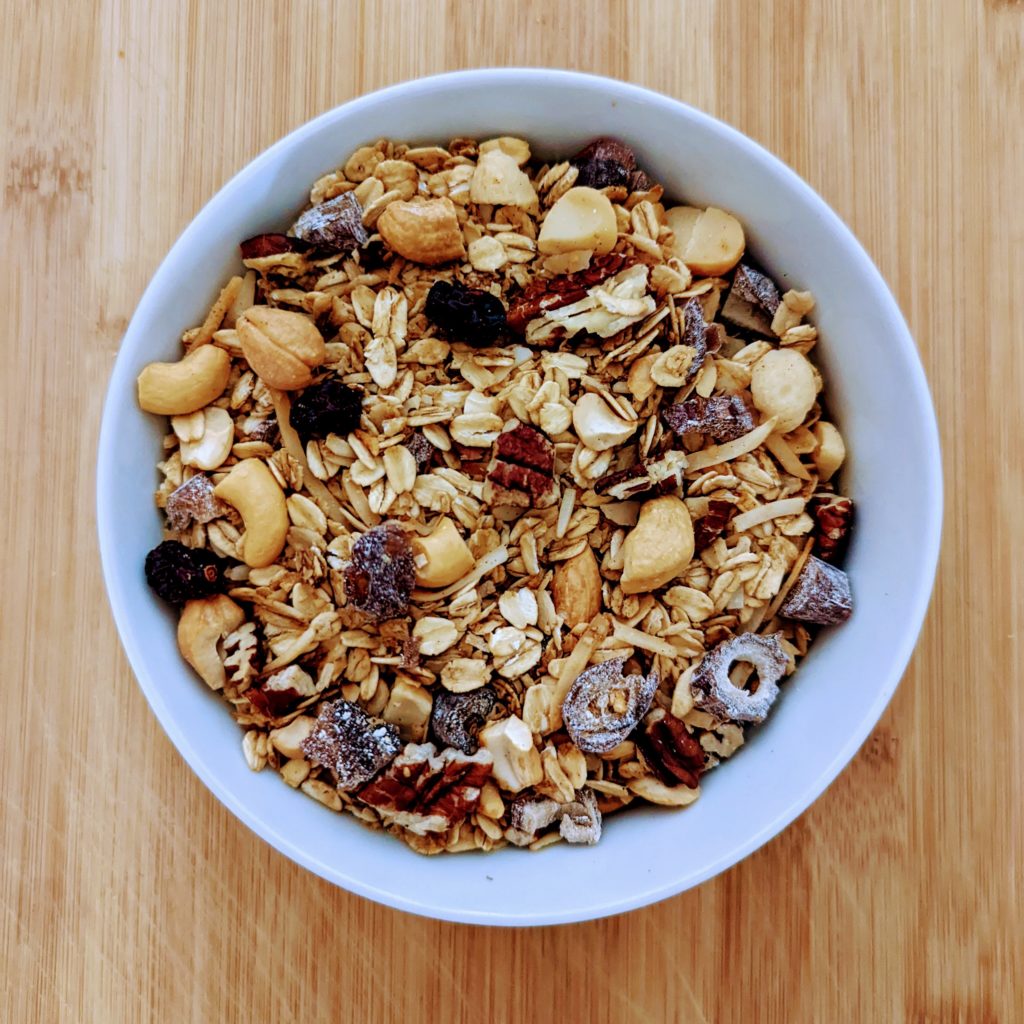 Since it's so versatile and easy to transport, Muesli makes the best treat to have at work, take it with you on the road or just enjoy it as a meal with a variety of toppings. Put it in a mason jar, screw on the lid, and take it with you! Oats are very satisfying and this snack can keep you full for hours. 
The end result is a lightly sweetened, slightly crunchy muesli. Try it with cold oat milk, or heat it up together with the milk to create a hot cereal. The add ons are endless from coconut yogurt to dried fruit, fresh fruit or seeds. I love the texture, flavors, flexibility and creativity in this delicious muesli!